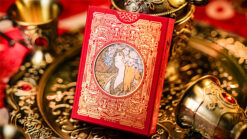 Red Mucha playing cards with Art Nouveau design for magic tricks.