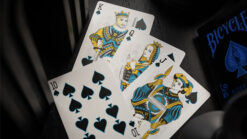 Bicycle blue neon playing cards featuring a royal rider design for magic tricks and card performance.