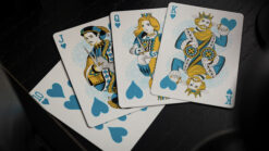 Set of Bicycle blue neon playing cards featuring royal court cards for magic tricks.