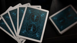 Bicycle neon blue playing cards with intricate butterfly design, perfect for magic tricks and card e.