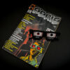Close-up of a spooky magazine cover titled "Eerie" with vintage 3D glasses on top.