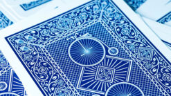 Blue Koran deck for magic tricks, featuring intricate geometric and floral patterns.