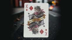 Playful biker cats illustrated on collectible playing card featuring King of Diamonds.
