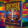 Psychedelic Bicycle playing cards with vibrant, colorful skull design for magic tricks and card enth.