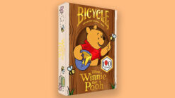 Disney Winnie the Pooh bicycle playing card featuring Pooh with honey jar and bees.