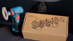 Portable angle grinder and box with "Shining" label for magic tricks.