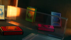 Clear plastic card protector for 5 decks, ideal for magic tricks and card displays.