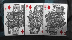 Close-up of Slate Tally-Ho playing cards featuring intricate black and white king, queen, and jack d.