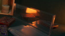 Protective transparent case for storing four decks of cards securely. Ideal for magicians and card e.