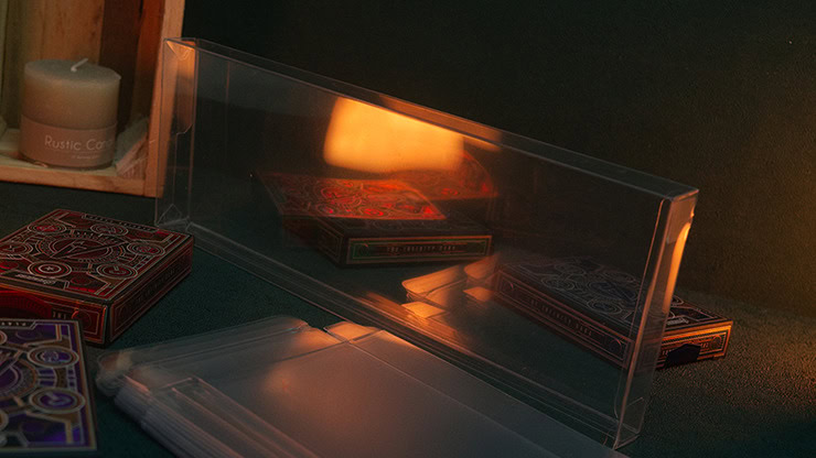Protective transparent case for storing four decks of cards securely. Ideal for magicians and card e.