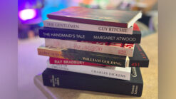 Stacked books including 