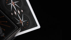 Close-up of Mr. Black V1 playing cards with intricate design details.