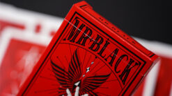 Close-up of Mr. Black V1 red playing cards for magic tricks and card illusions.