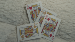 Johnny the Monkey performing card tricks with a deck of playing cards.