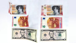 Close-up of a magic trick using US dollar and euro banknotes by Wang Zhe & Bacon Magic.