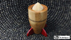Wooden rocket toy for magic tricks and challenges, perfect for magic performances and entertainment.