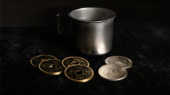 Silver coins and metal mug used in magic tricks by Mr. Daba.