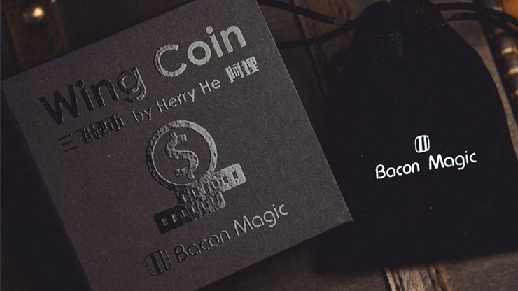 Close-up of Wing Coin by Harry He for magic tricks, featuring a sleek design and professional presen.