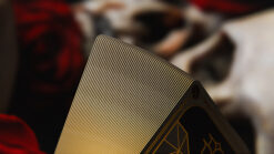 Luxurious gilded skulls and roses playing cards from the Gilded Edition.
