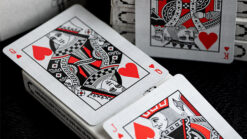 Close-up of Ace Fulton’s Casino Bootleg Playing Cards featuring intricate red, black, and white desi.